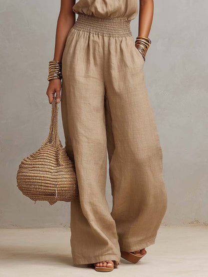 Benedetta - Tuta con pantaloni a gamba larga e scollo all’americana