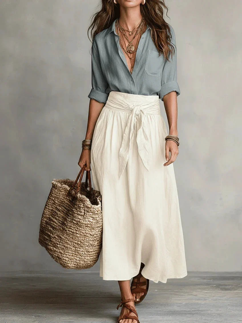 Vita - Elegante completo a due pezzi con camicetta nera e gonna midi
