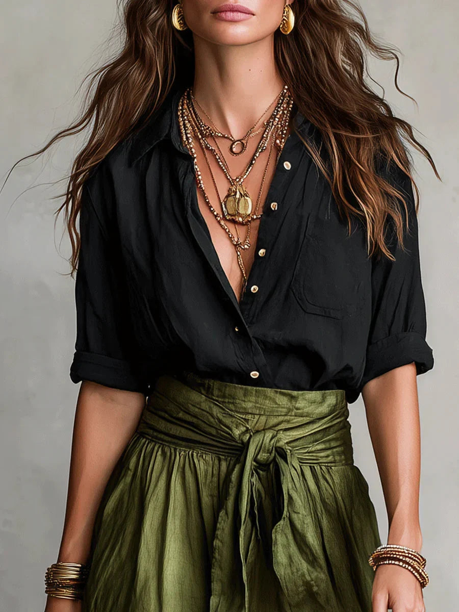 Vita - Elegante completo a due pezzi con camicetta nera e gonna midi