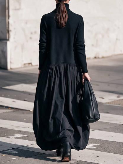 Barbara - Abito lungo oversize con collo alto e tasche decorative