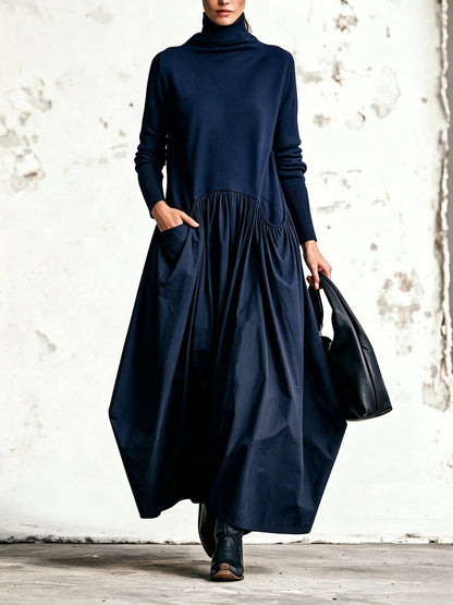 Barbara - Abito lungo oversize con collo alto e tasche decorative