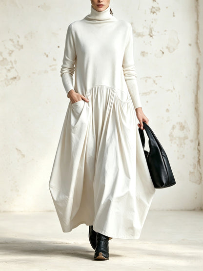 Barbara - Abito lungo oversize con collo alto e tasche decorative